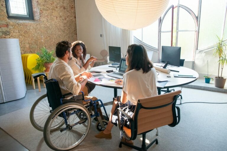 people having a meeting at the office